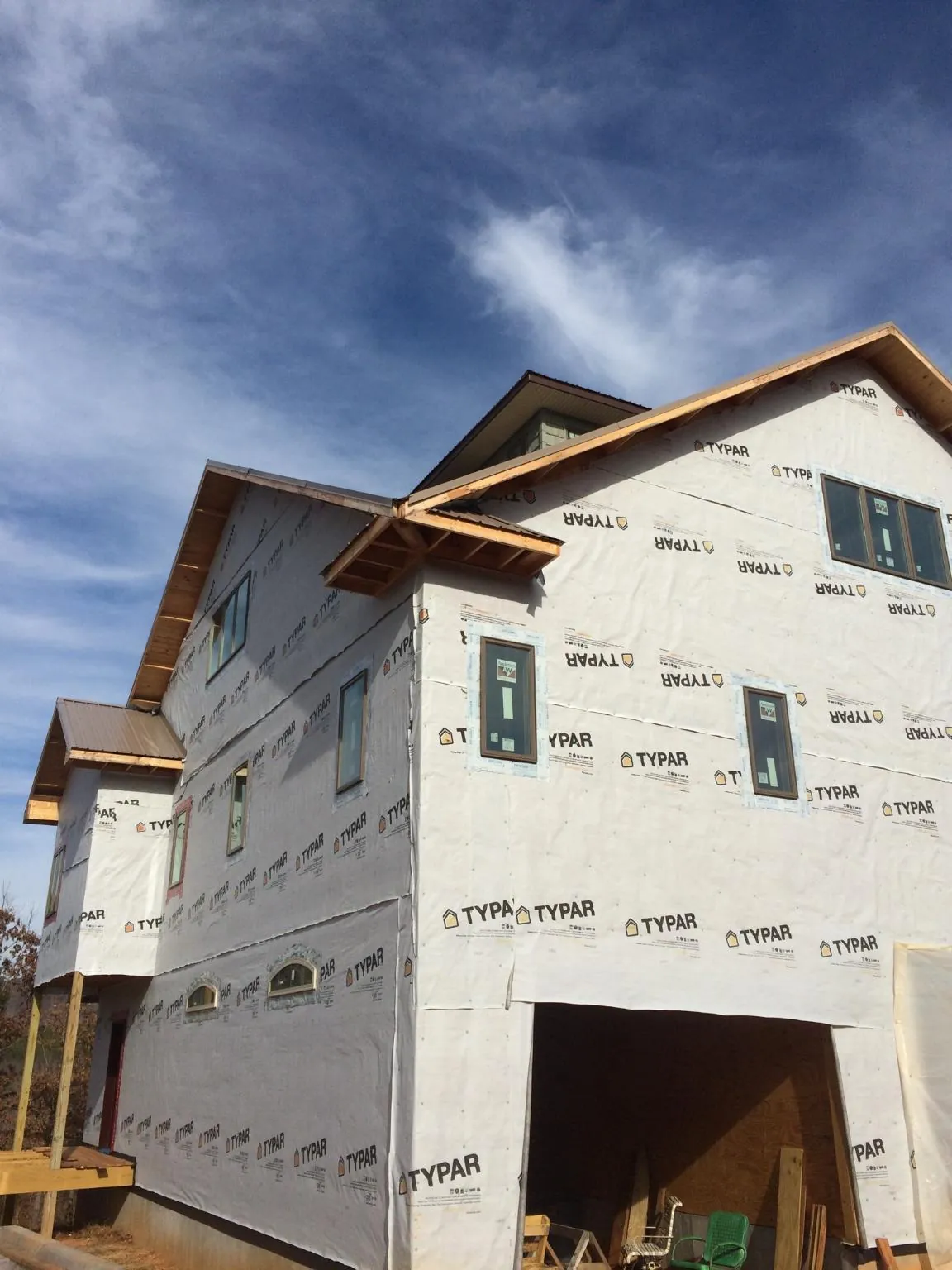 Stick built house wrapped in Typar with new roof framing and dormers in Preston Park